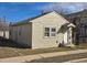Side view of home showing siding, windows, roofline, and ladder resting against the building at 914 La Farge Ave, Louisville, CO 80027