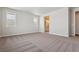 Bright bedroom with neutral carpet and en-suite bathroom access at 5009 Hickory Oaks St, Castle Rock, CO 80104