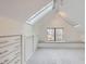Finished attic space with skylight, storage, carpeting, and natural light at 1474 Clayton St, Denver, CO 80206