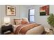 Inviting bedroom featuring decor, a neutral color palette, and lots of natural light at 1474 Clayton St, Denver, CO 80206