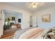 Comfortable bedroom with cozy decor, inviting bed, and relaxing living area at 1474 Clayton St, Denver, CO 80206