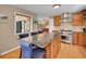 Spacious kitchen island with seating, perfect for entertaining at 11768 Black Hawk Dr, Conifer, CO 80433