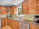 Kitchen with granite counters, stainless steel appliances, and view at 11768 Black Hawk Dr, Conifer, CO 80433