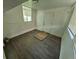 Room with vinyl flooring, window and door at 1272 N Ulster St, Denver, CO 80220