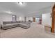 Finished basement with a large sectional sofa at 9416 Mcshane Ct, Parker, CO 80134