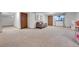 Spacious finished basement with carpet flooring and a comfortable seating area at 9416 Mcshane Ct, Parker, CO 80134