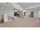 Open basement featuring neutral carpet, a toy kitchen and a partial view into another room at 9416 Mcshane Ct, Parker, CO 80134