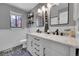 Bathroom with dual sinks, subway tile, and stylish fixtures at 9416 Mcshane Ct, Parker, CO 80134