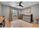 Cozy bedroom with a large window and natural light at 9416 Mcshane Ct, Parker, CO 80134