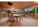 Inviting patio with outdoor dining set, perfect for enjoying scenic views and outdoor meals at 9416 Mcshane Ct, Parker, CO 80134