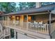 Spacious upper-level patio with stylish railing and comfortable seating arrangement at 9416 Mcshane Ct, Parker, CO 80134