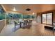 Inviting patio with an outdoor dining set, perfect for enjoying scenic views and outdoor meals at 9416 Mcshane Ct, Parker, CO 80134