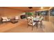 Spacious covered porch featuring comfortable seating and an outdoor dining space at 9416 Mcshane Ct, Parker, CO 80134