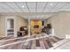 Spacious finished basement with a modern fireplace, stylish flooring and neutral paint tones at 22978 E Bailey Cir, Aurora, CO 80016