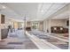 Spacious basement area with room for seating, barstool area, and exterior access at 22978 E Bailey Cir, Aurora, CO 80016