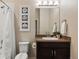 Bathroom with shower and flower artwork at 22978 E Bailey Cir, Aurora, CO 80016