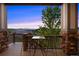 Charming covered patio with scenic views, perfect for enjoying sunsets and outdoor relaxation at 22978 E Bailey Cir, Aurora, CO 80016