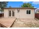 Backyard featuring a small raised platform and some sparse greenery at 8401 Sandreed Cir, Parker, CO 80134