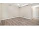Bedroom with wood-look flooring, a ceiling fan, and a light-colored paint at 8401 Sandreed Cir, Parker, CO 80134