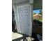 Outdoor back door with a covered patio area featuring a couch and outdoor space at 11502 E 7Th E Ave, Aurora, CO 80010