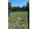 Large backyard space featuring a partial rock area with a dark wooden fence at 11502 E 7Th E Ave, Aurora, CO 80010