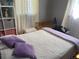 Light-filled bedroom with neutral color scheme and space for relaxation and rest at 11502 E 7Th E Ave, Aurora, CO 80010