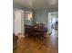 Dining room boasts hardwood floors and elegant lighting at 11502 E 7Th E Ave, Aurora, CO 80010
