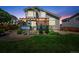 Cozy backyard featuring a charming deck with a pergola, ideal for outdoor relaxation and entertaining guests at 16863 Trail View Cir, Parker, CO 80134