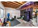 Basement exercise area featuring a sauna, exercise ball, punching bag, and padded floor at 16863 Trail View Cir, Parker, CO 80134
