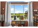 Bright breakfast nook with a large window showcasing views of the backyard and neighborhood at 16863 Trail View Cir, Parker, CO 80134