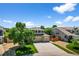 Charming two-story home featuring a well-manicured lawn, mature trees, and a spacious two-car garage at 16863 Trail View Cir, Parker, CO 80134