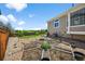 Picturesque backyard featuring a custom garden with raised beds, rock landscaping, and a manicured lawn at 16863 Trail View Cir, Parker, CO 80134