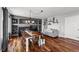 Cozy living room showcasing a fireplace, dining area, and comfortable seating at 16863 Trail View Cir, Parker, CO 80134