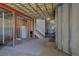 Unfinished basement with potential for a variety of uses, including a gym, kitchenette, and storage at 6300 Summer Star Ln, Golden, CO 80403
