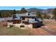 Stunning exterior of the home featuring stone accents and multi-car garage at 6300 Summer Star Ln, Golden, CO 80403