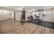 This partially finished basement space is currently set up as a home gym at 13486 Clayton St, Thornton, CO 80241