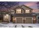 Charming two-story home featuring a two-car garage, brick accents and beautiful landscaping at 13486 Clayton St, Thornton, CO 80241