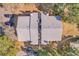 Aerial view of the complex showing roof details and tree coverage at 14473 E Jewell Ave # 202, Aurora, CO 80012
