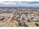 Expansive aerial view showcases the condo complex with a mix of residential and commercial areas at 14473 E Jewell Ave # 202, Aurora, CO 80012
