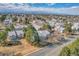 Panoramic aerial view of a condo community with mature trees and convenient access to city amenities at 14473 E Jewell Ave # 202, Aurora, CO 80012