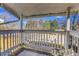 Balcony with views of mature trees, offering a private space for relaxation and enjoying the outdoors at 14473 E Jewell Ave # 202, Aurora, CO 80012
