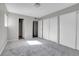 Bedroom with ample storage and a neutral color palette is ready for move-in at 14473 E Jewell Ave # 202, Aurora, CO 80012