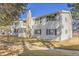 Charming condo with a stone chimney and manicured lawn offers a welcoming curb appeal at 14473 E Jewell Ave # 202, Aurora, CO 80012