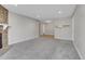 Spacious living room with a stone fireplace and neutral color palette is move-in ready at 14473 E Jewell Ave # 202, Aurora, CO 80012