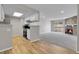 The floorplan boasts an open space with hardwood floors and a stone fireplace at 14473 E Jewell Ave # 202, Aurora, CO 80012