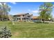 Charming townhome with a well-manicured lawn and inviting exterior in a desirable community at 8408 Everett Way # B, Arvada, CO 80005