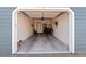 Spacious one-car garage with ample storage, overhead lighting, and convenient access to the home at 8408 Everett Way # B, Arvada, CO 80005