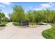 Scenic view of Arvada Volunteer Fire Fighters Park with walking paths surrounded by lush greenery at 8408 Everett Way # B, Arvada, CO 80005