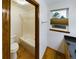 Bathroom view showcasing a bathtub, toilet, and a window with natural light at 2720 E 121St Pl, Thornton, CO 80241