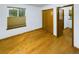 Cozy bedroom with hardwood floors, ample closet space, and a bright window at 2720 E 121St Pl, Thornton, CO 80241